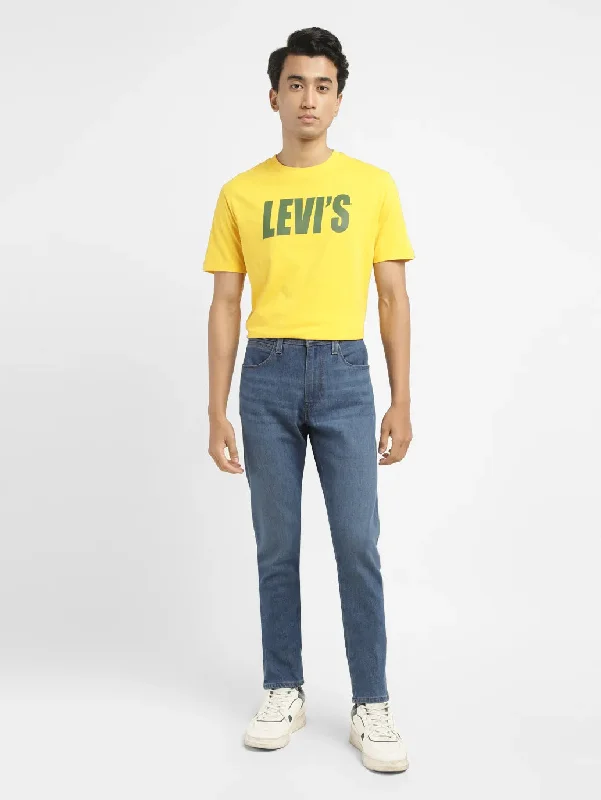 Men's Distressed Jeans with Patches for a Retro and DIY - Inspired AppearanceMen's 512 Mid Indigo Slim Tapered Fit Jeans Men's Distressed Jeans with Patches for a Retro and DIY - Inspired AppearanceMen's 512 Mid Indigo Slim Tapered Fit Jeans