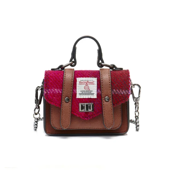 Leather men vest with studded details for a biker lookIslander® Tartan Wee Satchel with Harris Tweed® Leather men vest with studded details for a biker lookIslander® Tartan Wee Satchel with Harris Tweed®