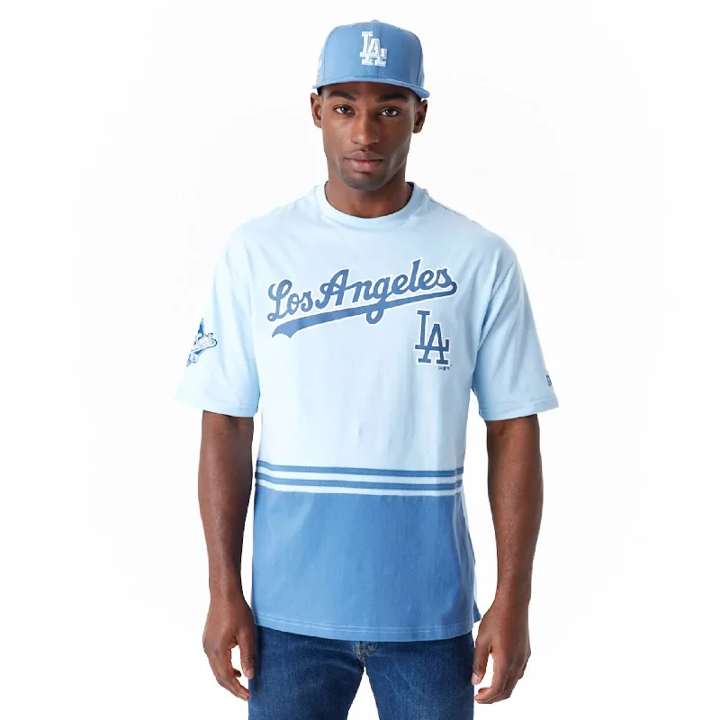 Men's v - neck muscle t - shirts for a body - building aestheticLA Dodgers World Series Pastel Blue Oversized T-Shirt